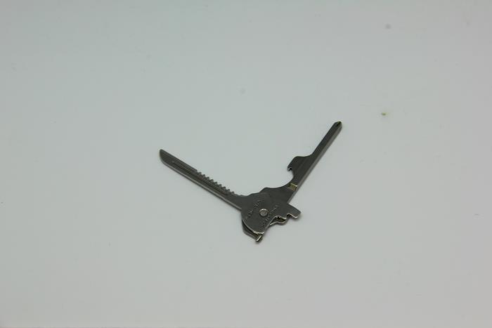 Ключ-брелок многофункциональный (нож, октрывалка, пилка, отвертка в шлиц и крест и т.д.)
